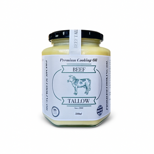 Premium grass-fed beef tallow in a 500ml glass jar for cooking.