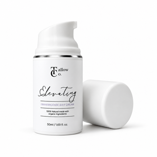 The Tallow Co. Elevating Frankincense Day Cream in a 50 ml white pump bottle with its cap beside it on a white background.