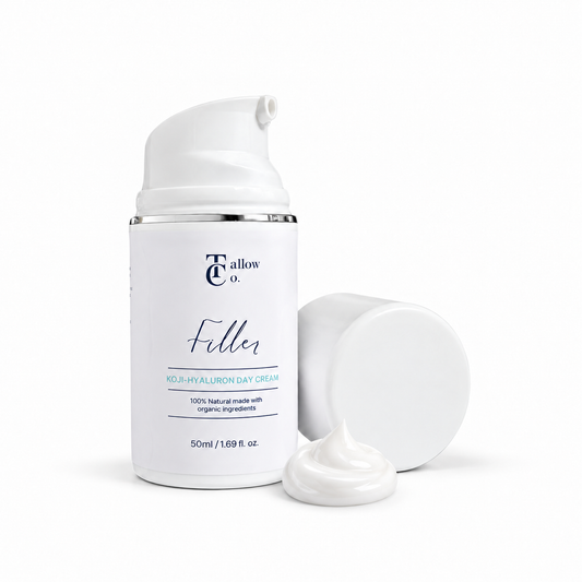The Tallow Co. Filler Koji-Hyaluron Day Cream in a 50 ml white pump bottle with its cap and a glossy white cream swirl beside it.