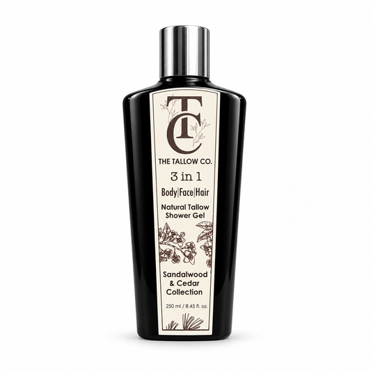 A black bottle of The Tallow Co. 3 in 1 Body/face/Hair Natural Tallow Shower Gel, featuring a cream-colored label with brown botanical illustrations and a shiny silver cap, set against a plain white background.